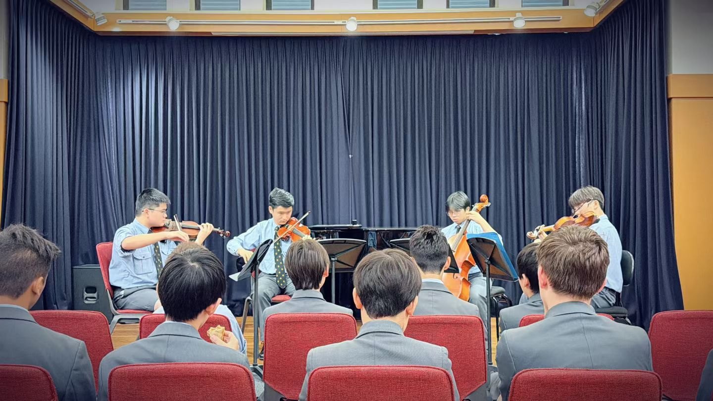 Vincent Huang’s string quartet performing on stage